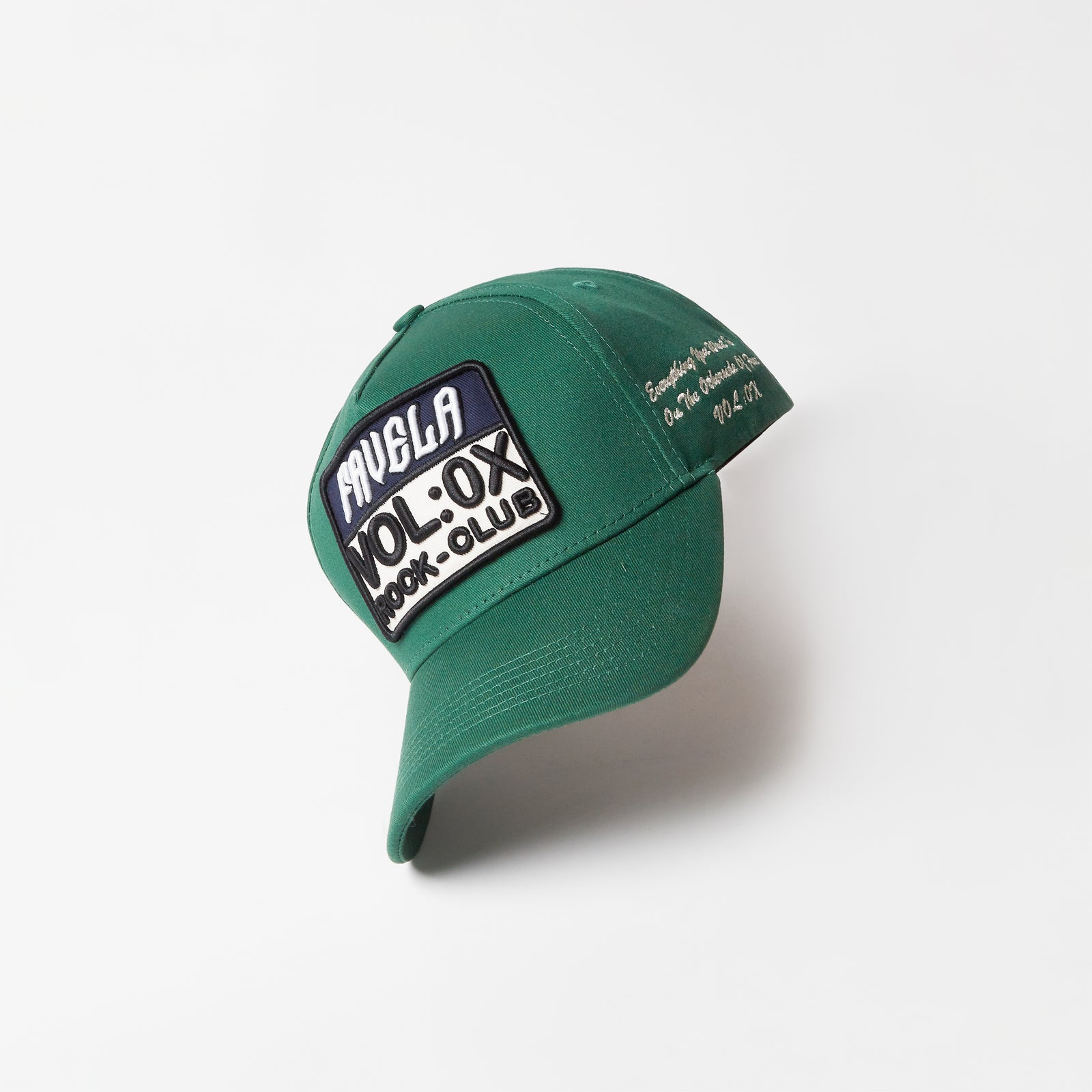 Volume 0X: Green Rock-club Cap – Favela Studios